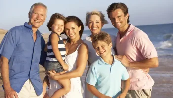 three generation family at the beach