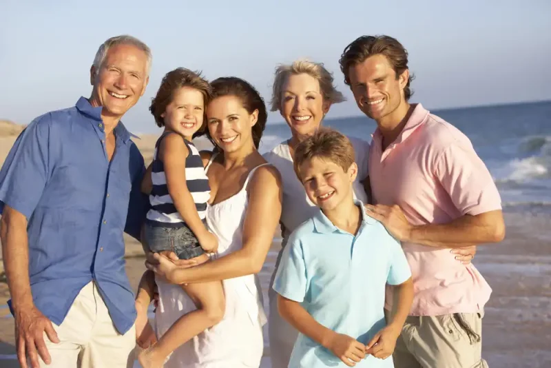 three generation family at the beach